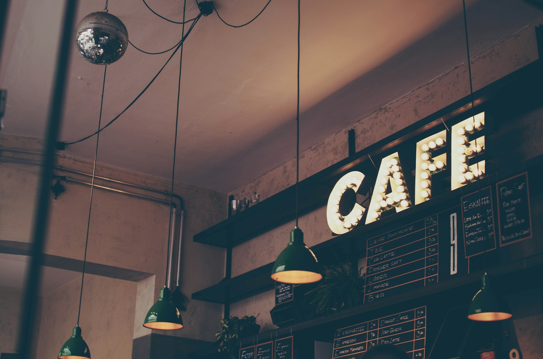 A welcoming independent coffee shop with sunlit tables